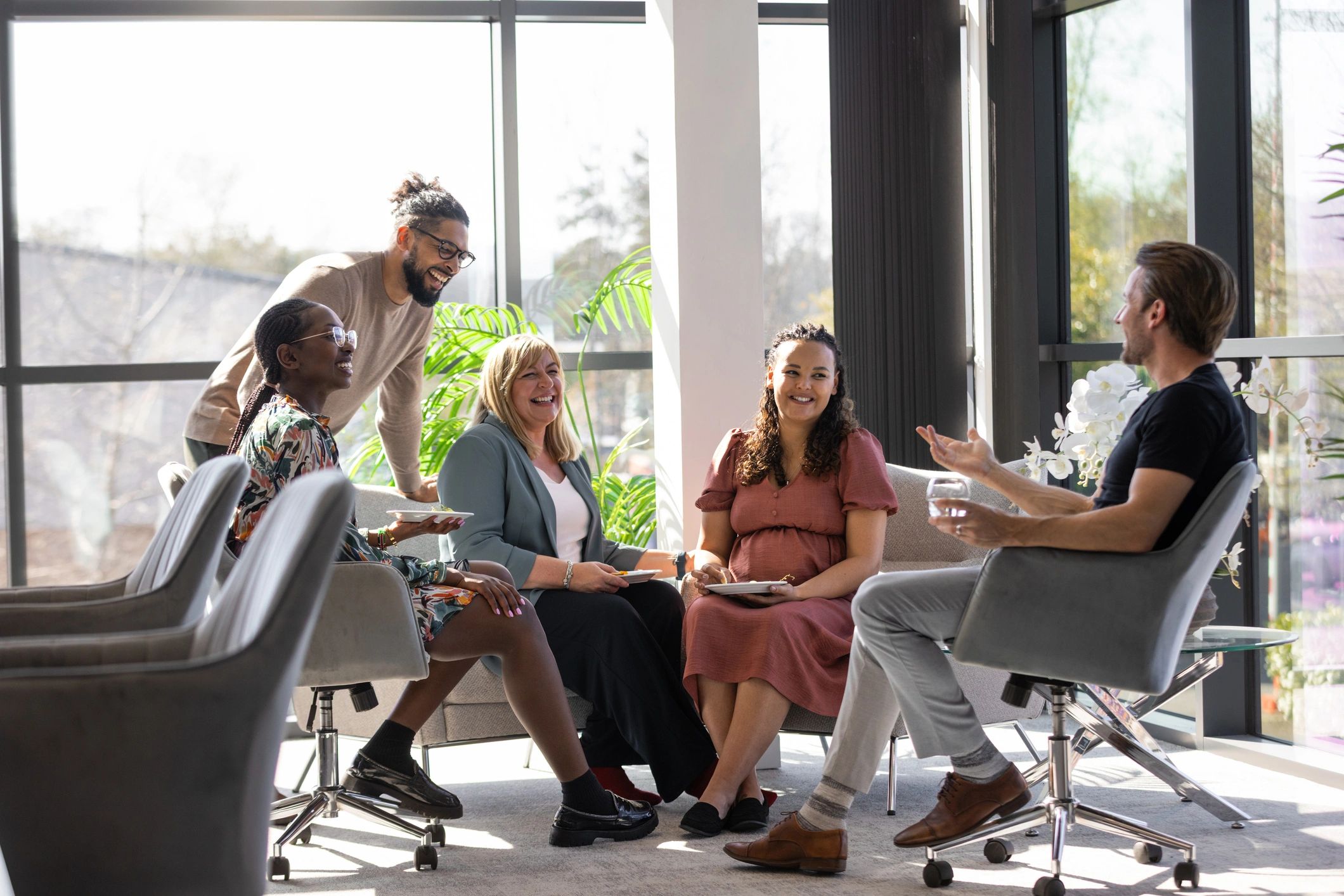 Business team meeting together in a bright office